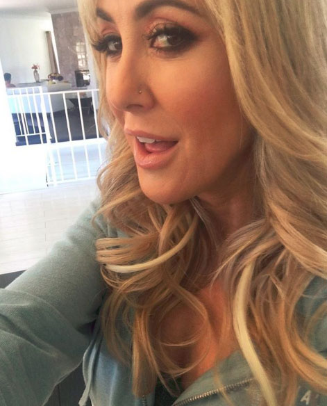 Brandi Love taking a selfie